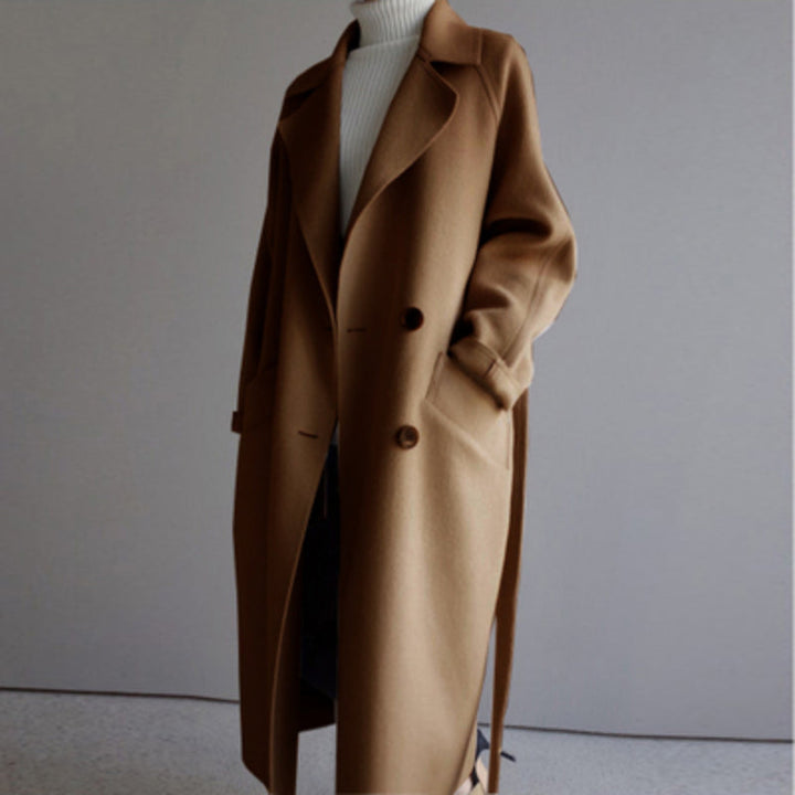 Long women's casual coat, essential for stylish and warm fall and winter everyday comfort.