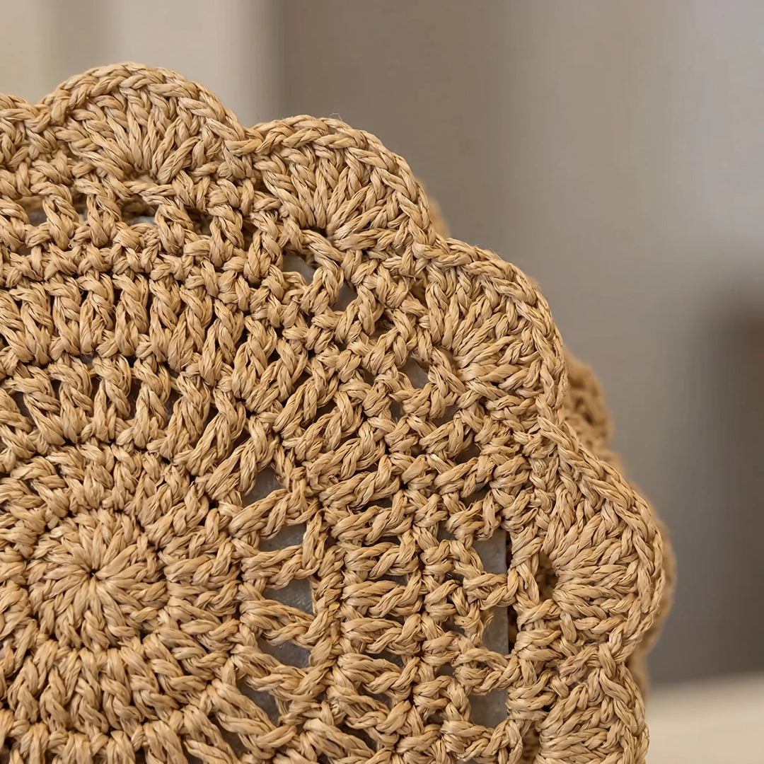 Lightweight woven crossbody bag for women, featuring a stylish scalloped flap, ideal for casual everyday use.