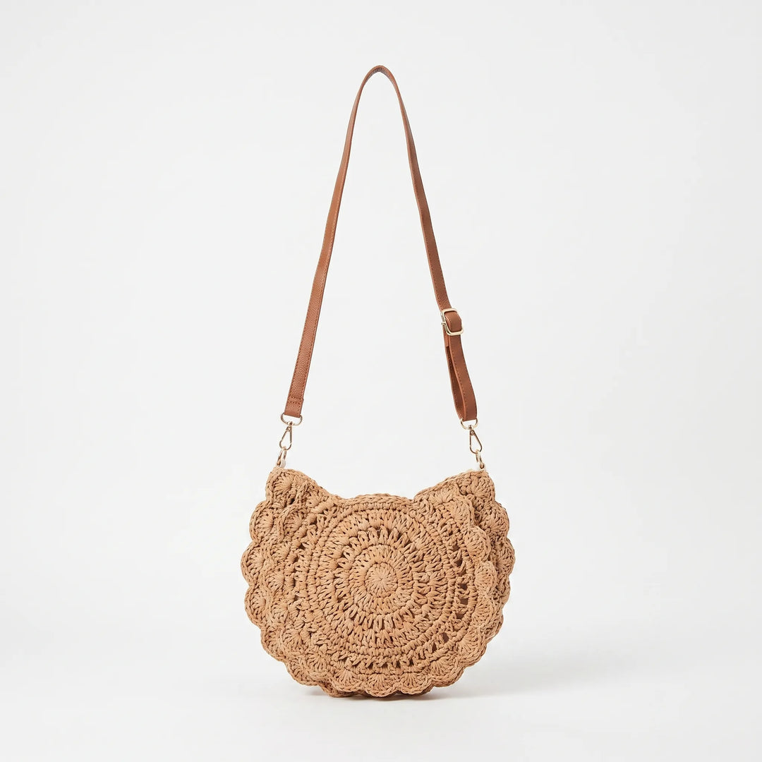 Stylish women's woven crossbody bag with an elegant scalloped flap design, perfect as a versatile shoulder bag.