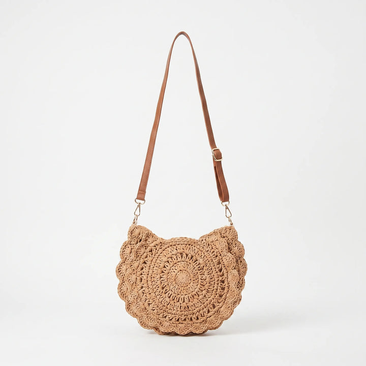 Stylish women's woven crossbody bag with an elegant scalloped flap design, perfect as a versatile shoulder bag.
