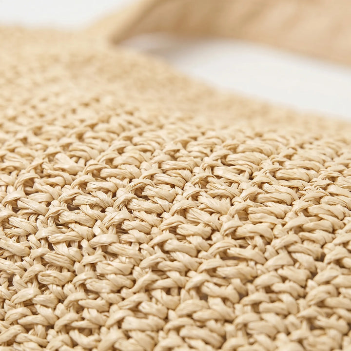 Fashionable open top woven shoulder bag for women, a versatile accessory for casual outfits.