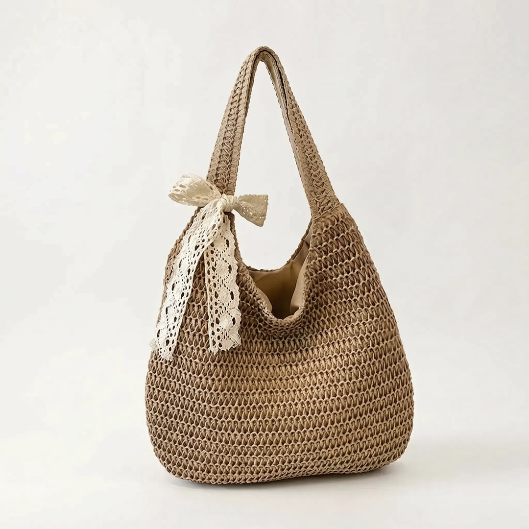 Versatile women's casual woven tote, an essential fashion accessory for spring and summer.