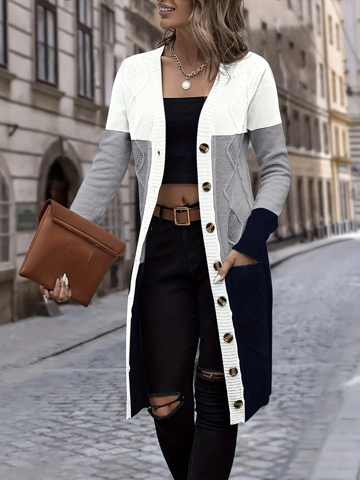 Chic women's long sleeve cardigan vest in Celeste blue. Versatile acrylic outerwear for casual fashion.