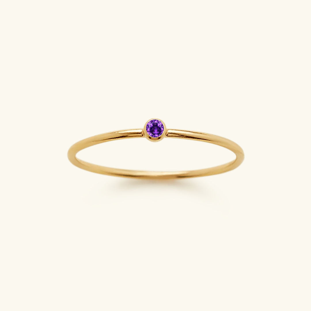 Elegant gold plated Celestia birthstone ring, custom women's jewelry with unique gemstone.