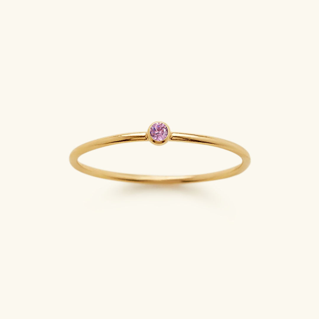 Elegant gold plated women's Celestia birthstone ring, custom and hypoallergenic jewelry.