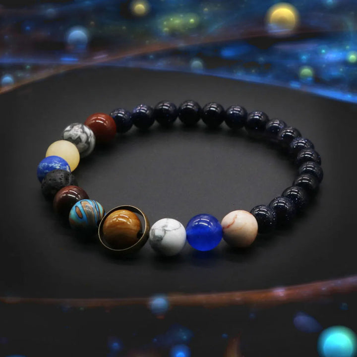 Stylish women's cosmos planet astronomy bracelet. Stretch bead jewelry, a unique celestial gift for her.