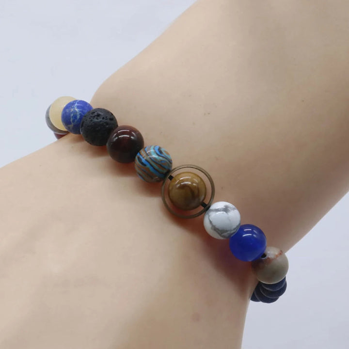 Detailed women's celestial planet bead bracelet depicting the solar system. Universe jewelry, stretch fit for her.