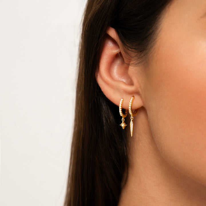 Sterling silver celestial star hoop earrings for women, modern and chic fashion jewelry.