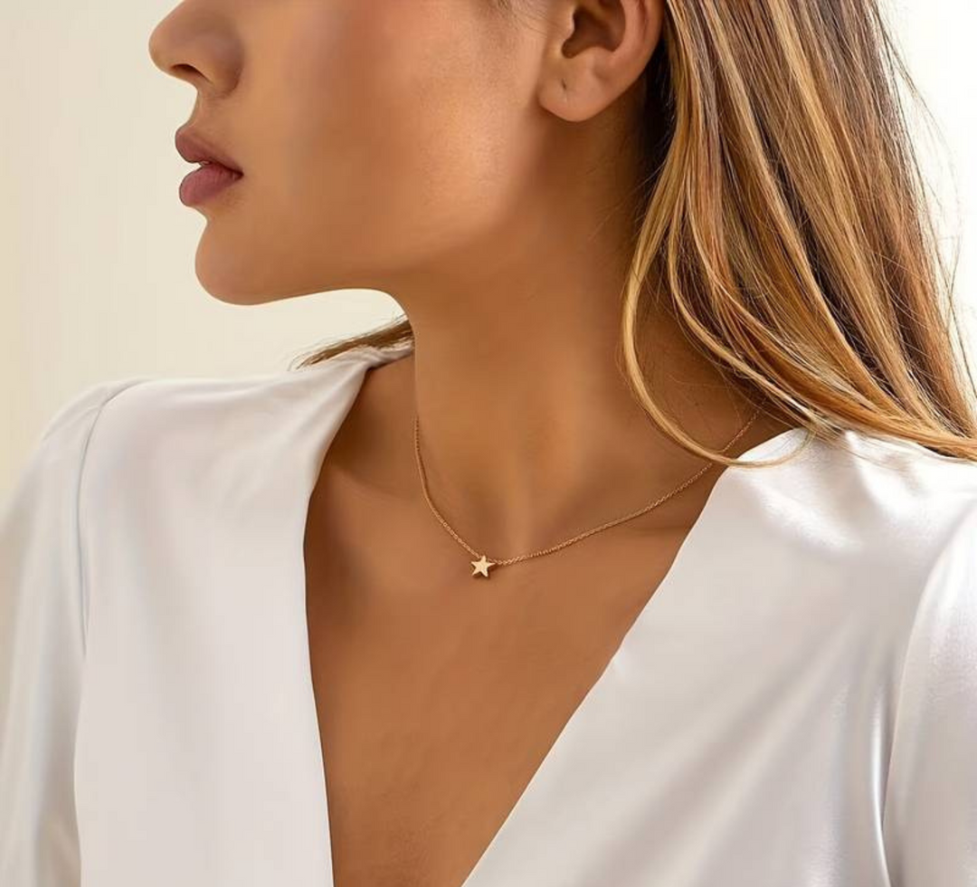 Lyra celestial star necklace for women, a beautiful gold or silver luck charm, adjustable & trendy.