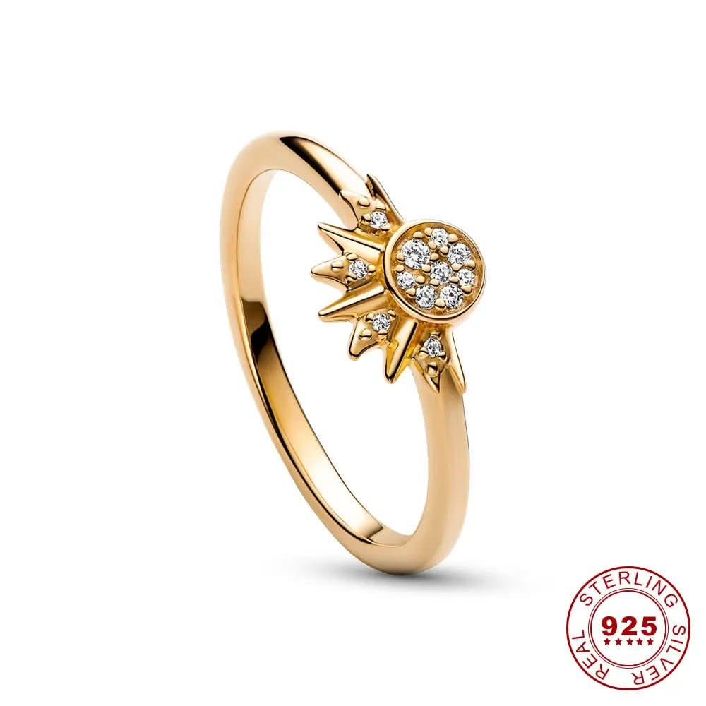 Women's sparkling crystal ring featuring celestial sun and moon, a timeless and elegant accessory.