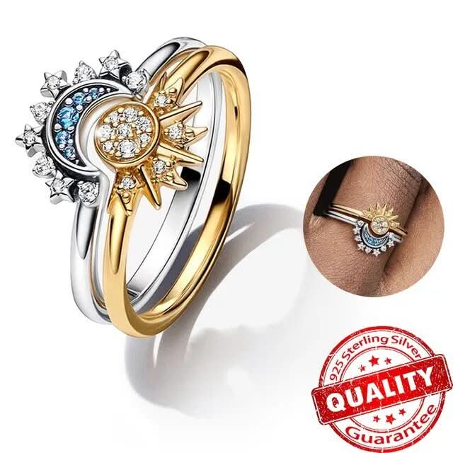 Polished women's celestial sun & moon ring, brilliant crystal accents, making a stylish fashion statement.
