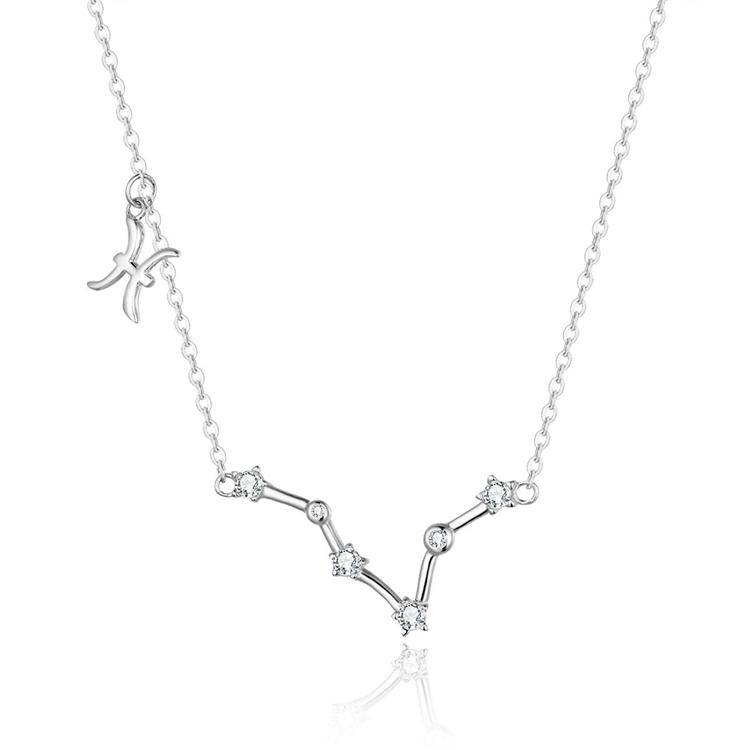 Celestial zodiac sign necklace displayed beautifully, sterling silver women's jewelry.