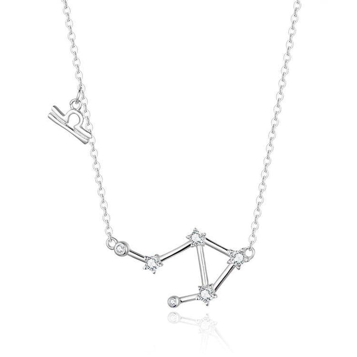 Women's celestial zodiac necklace, ideal for layering, sterling silver astrology.