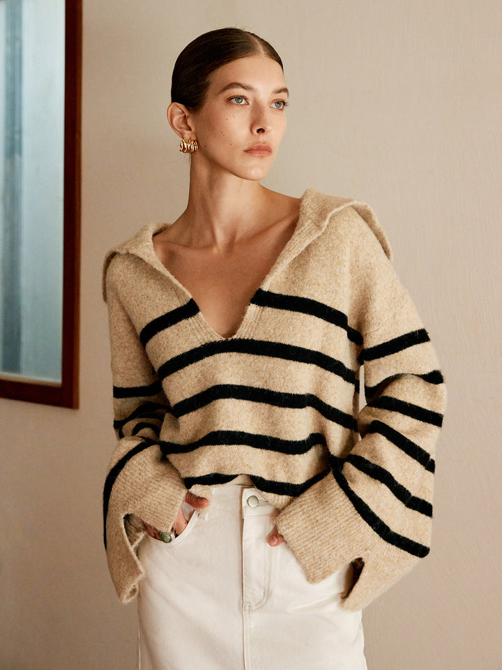 Chic women's oversized striped sweater, ideal for cozy autumn outings & winter casual fashion.