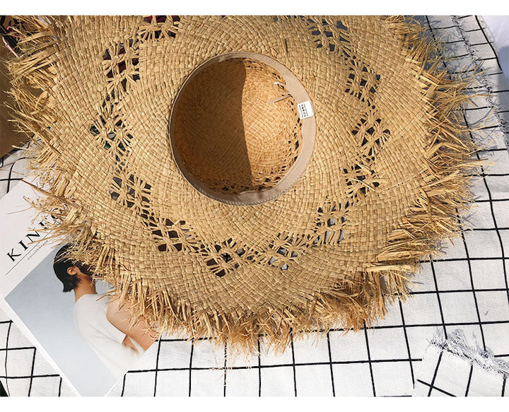 Elegant women's Celine floppy Panama sun hat in natural straw, ideal for summer and vacation accessory.