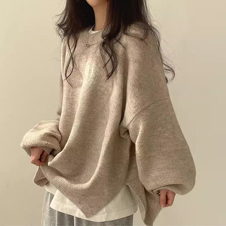 Celira women's oversized sweater, a comfortable long-sleeve knit with a split hem for relaxed casual fashion.