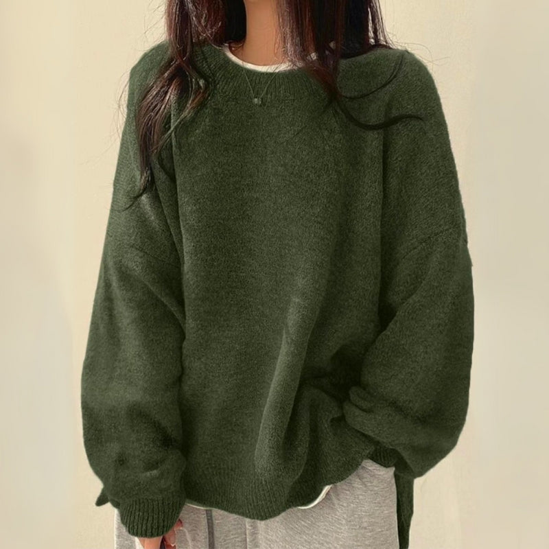 Relaxed fit Celira women's oversized sweater with a modern split hem, a versatile long-sleeve knit for comfort.
