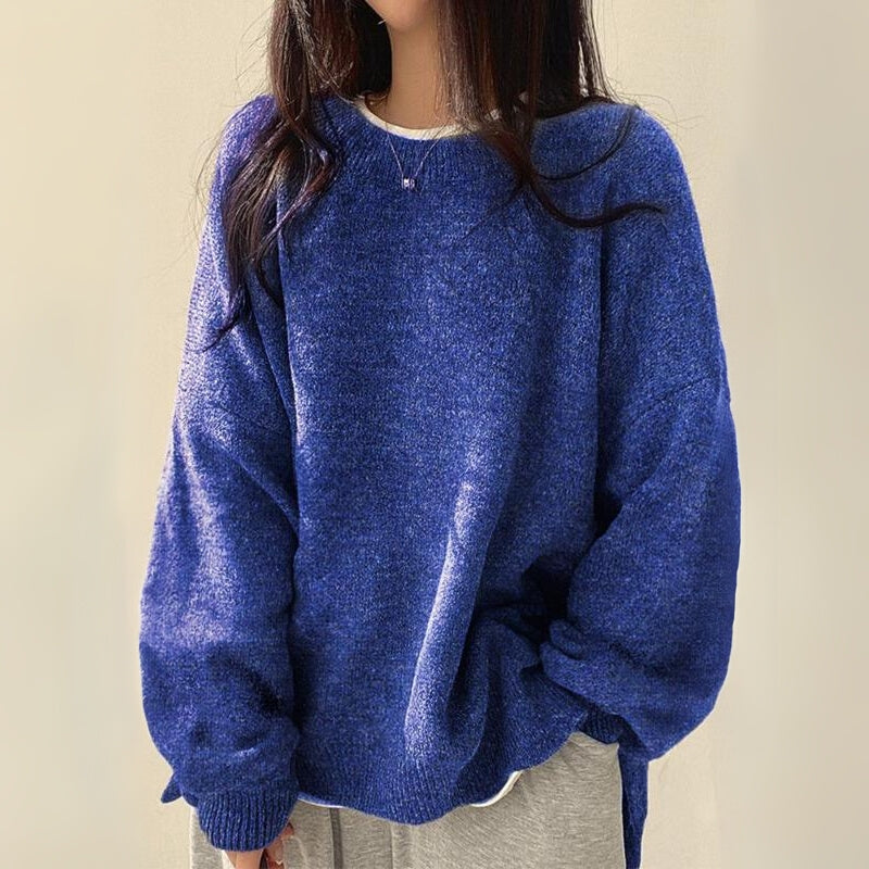 Casual Celira oversized women's sweater featuring a chic split hem, soft knit comfort for fall and spring fashion.