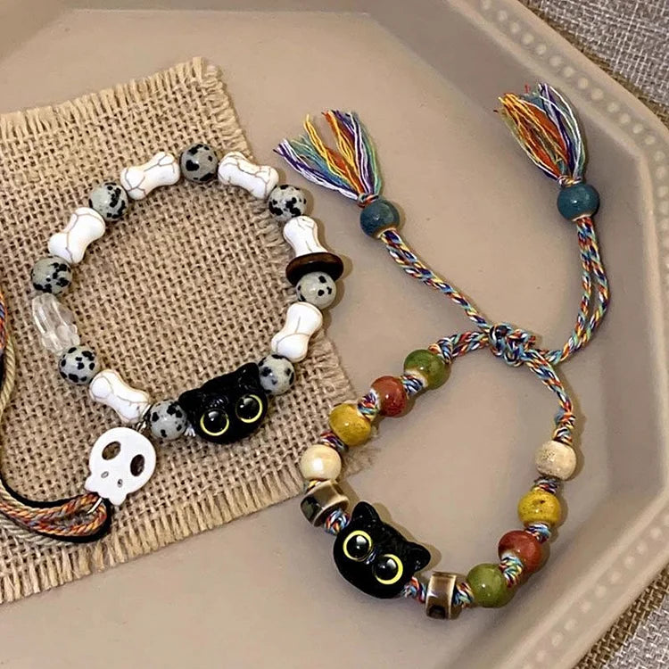 Handmade ceramic Kittens & Skull charm bracelet for women. Unique bohemian jewelry with playful fringe.