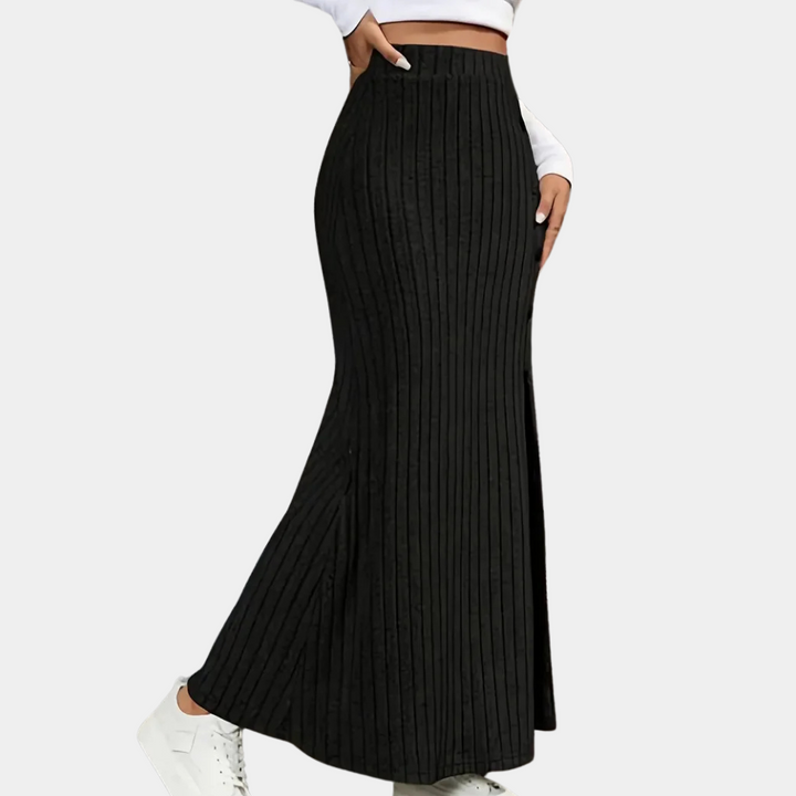 Woman's polyester ribbed knit maxi skirt in a rich burgundy color, perfect for fall fashion