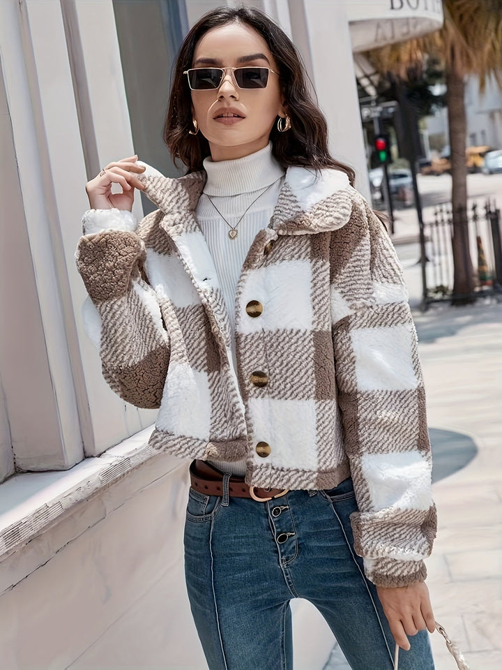 Chic women's oversized teddy jacket with classic checked pattern and front buttons. Perfect for fall/winter.