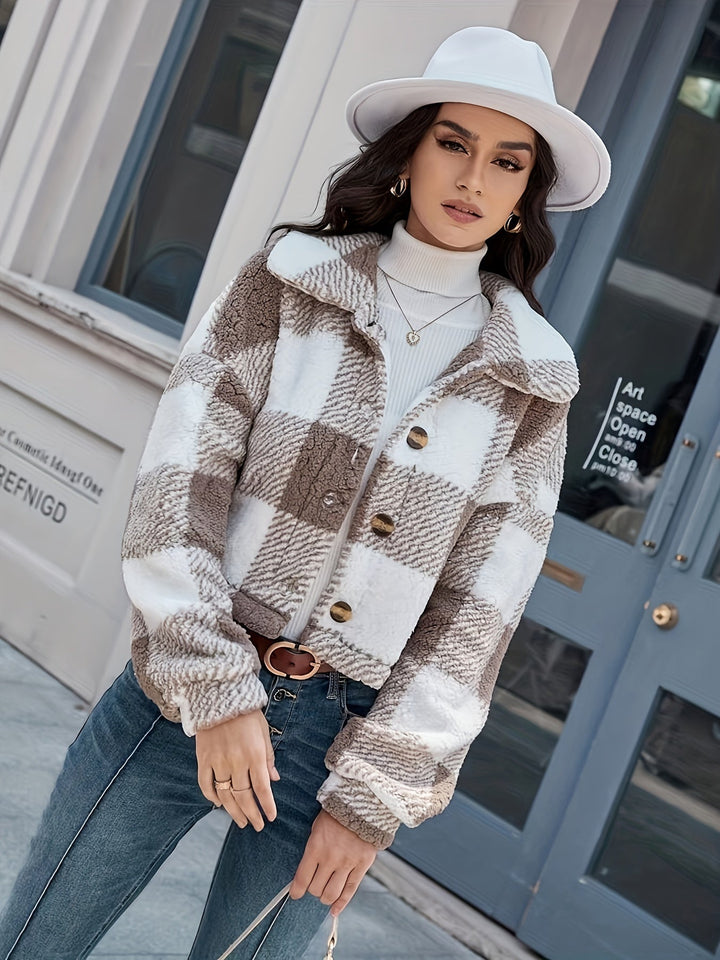 Stylish checked button-up coat for women. Warm, cozy, and chic outerwear for fall and winter seasons.