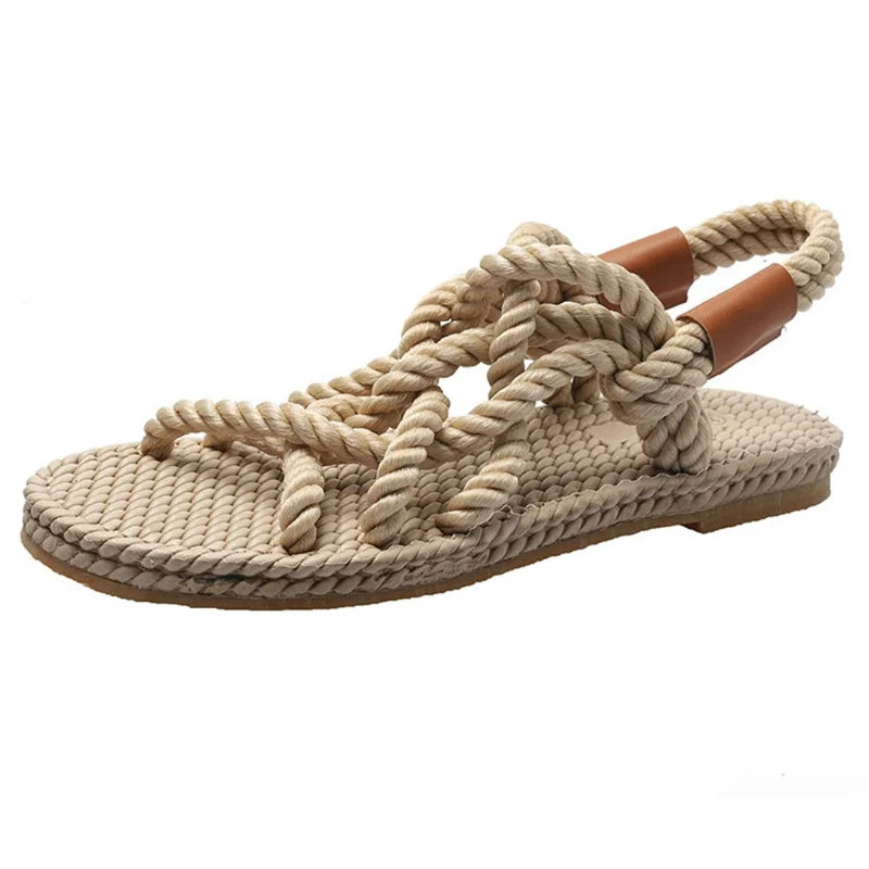 Versatile women's braided gladiator sandals, flat & comfortable summer footwear for beach, vacation, and casual style.