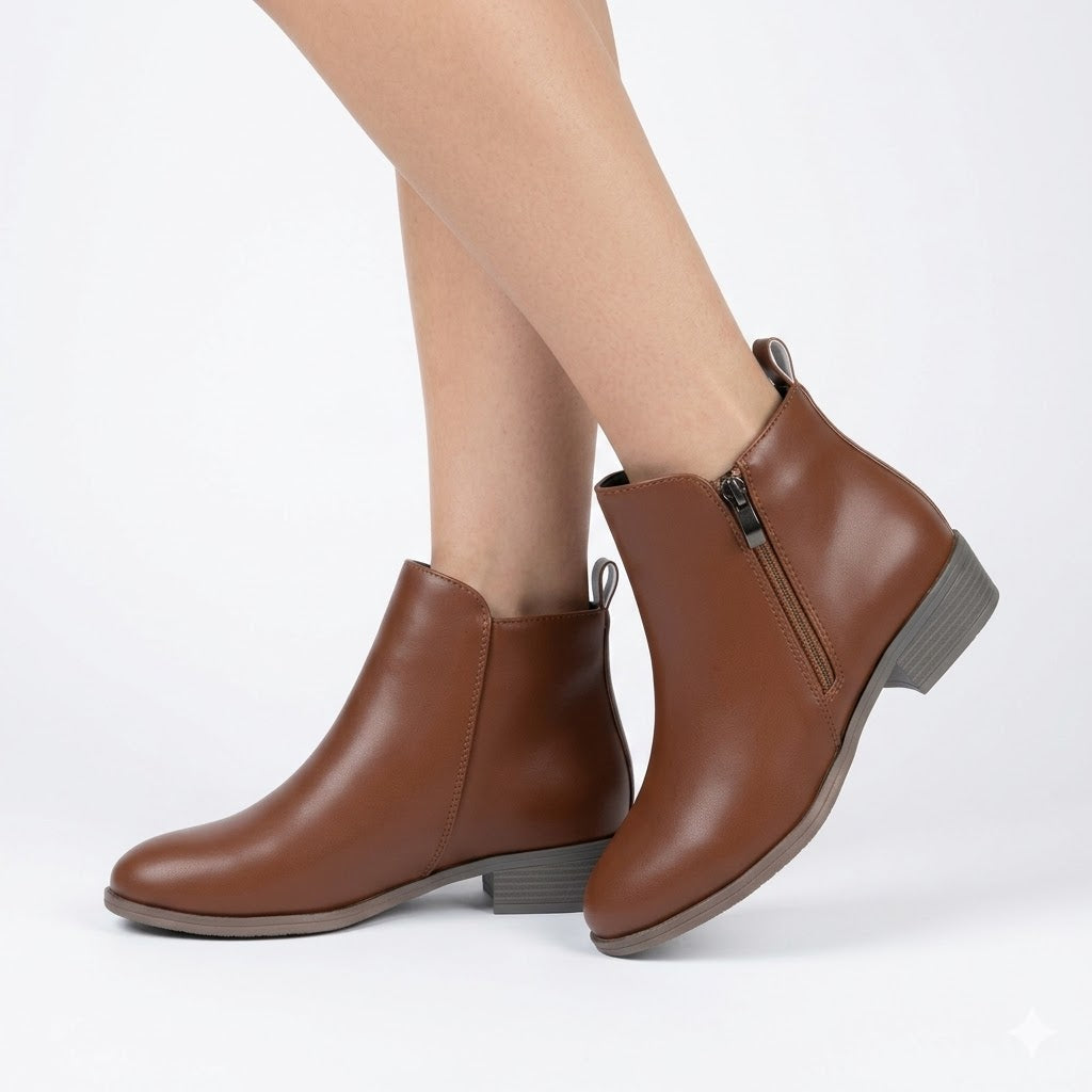 Women's chic black ankle boots with a sturdy block heel and convenient side zip, perfect for casual wear.