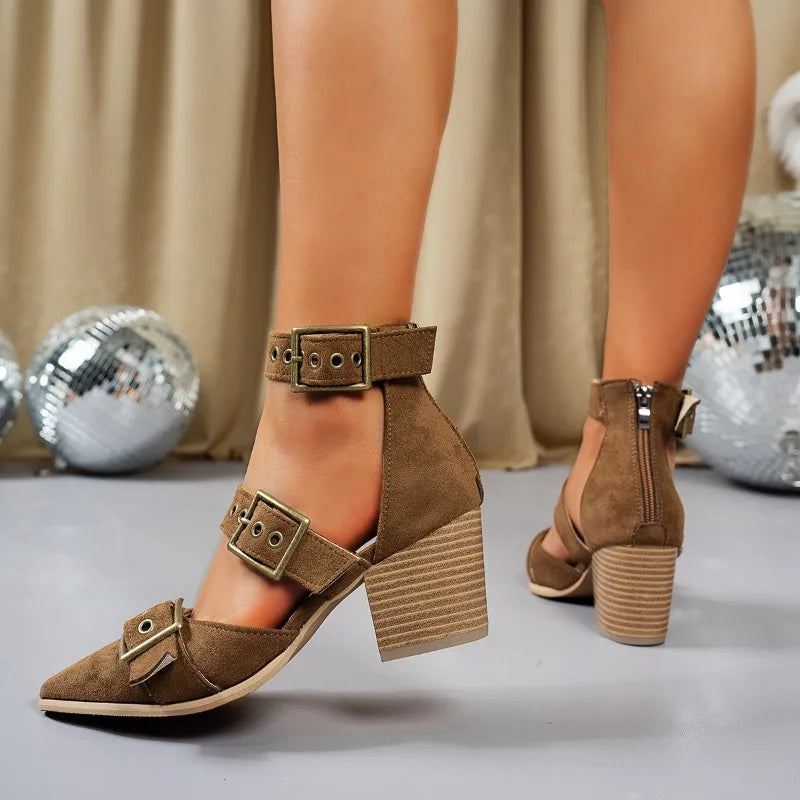 Everyday elegant: women's black block heels with a secure ankle buckle, offering both style and comfort.
