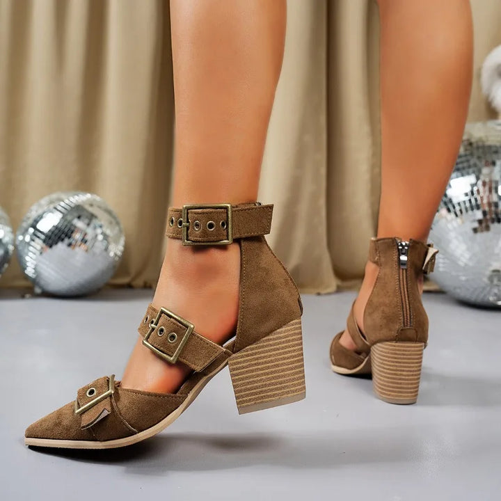 Everyday elegant: women's black block heels with a secure ankle buckle, offering both style and comfort.