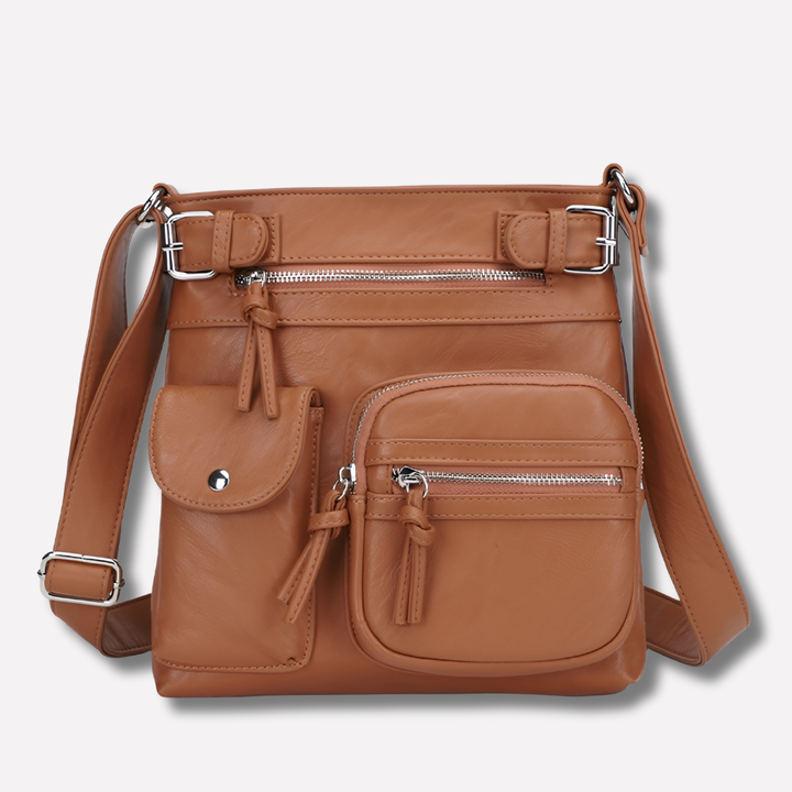 Stylish multi-pocket women's crossbody bag, ideal for travel, keeping essentials organized & secure.