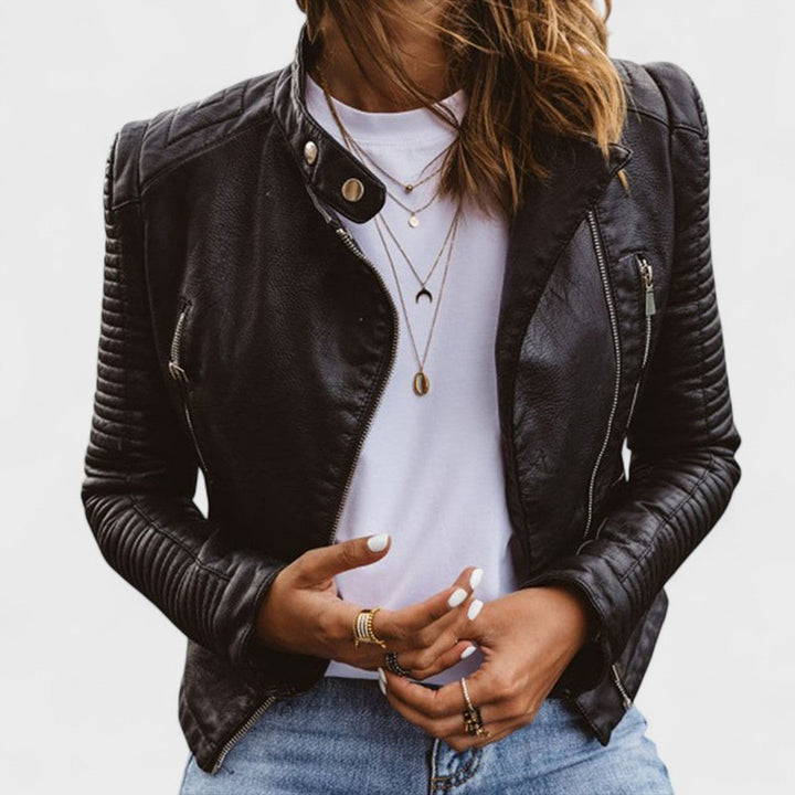 Women's chic black jacket, elegant and versatile for workwear or casual chic, featuring a classic slim fit.