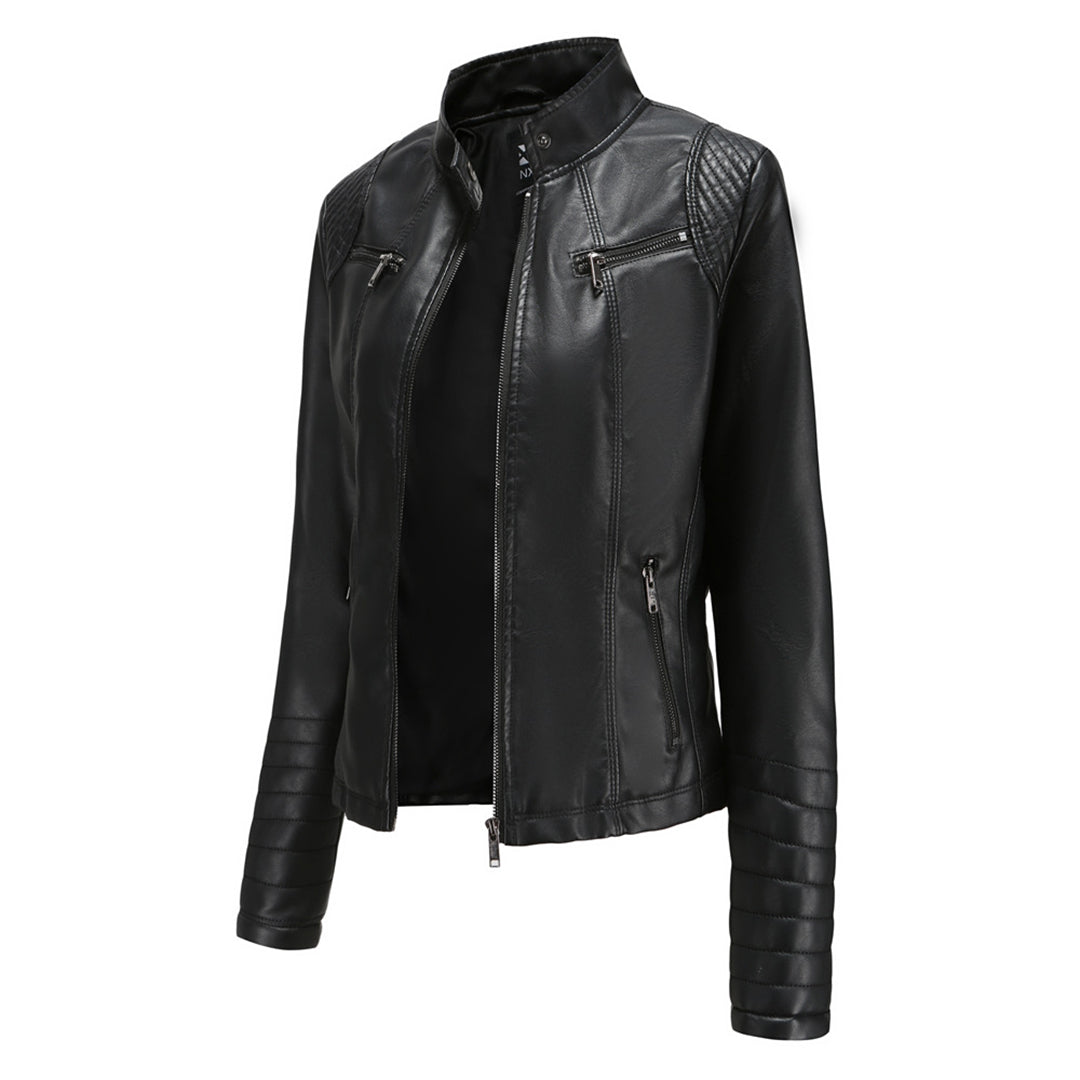 Stylish woman wearing an Elin black leather moto jacket, showcasing edgy street style.