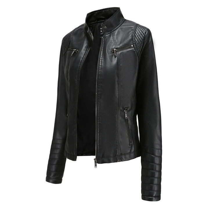 Stylish woman wearing an Elin black leather moto jacket, showcasing edgy street style.