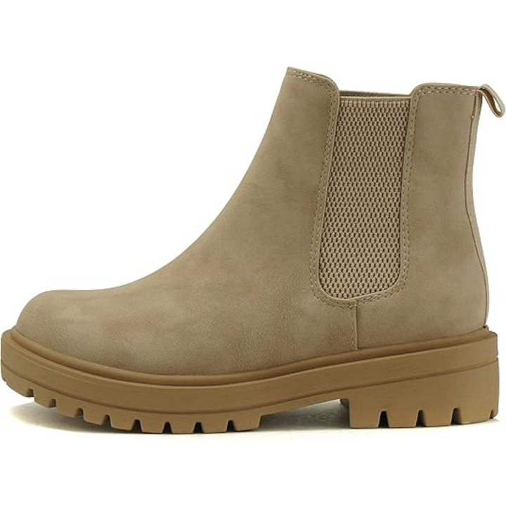 Side view of women's comfortable black Chelsea ankle boots with a modest low heel.