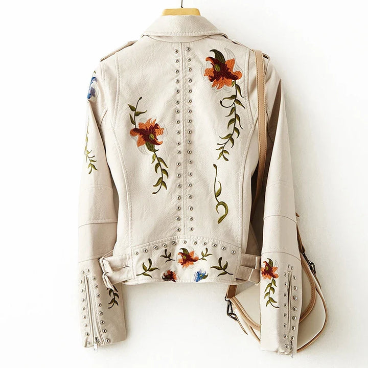 Stylish women's beige moto jacket, perfect for adding a rebel edge and contemporary fashion to any outfit.