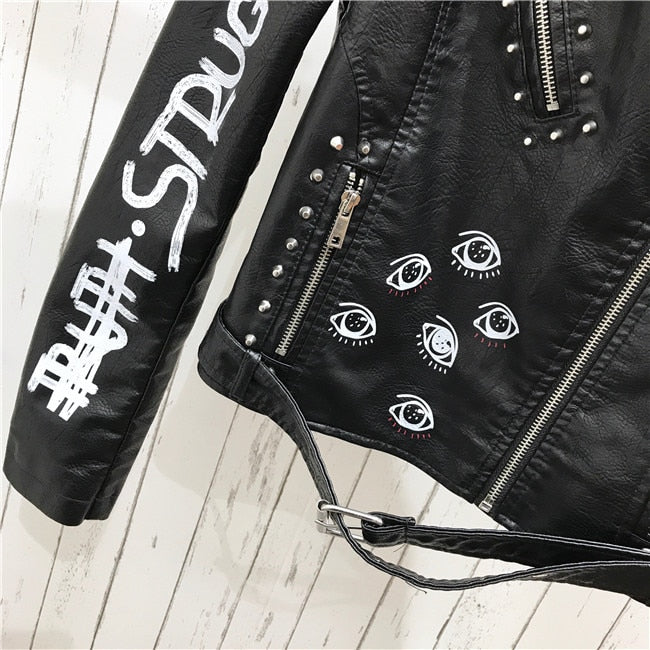 Model wearing a women's black edgy moto jacket, a chic statement piece for versatile casual outerwear.