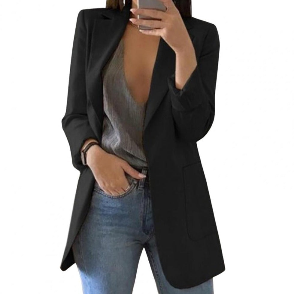 Women's chic black pocket blazer for professional workwear. Elegant versatile jacket for office & business.