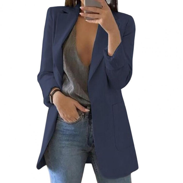 Elegant ladies' blazer with pockets. Professional yet versatile jacket for a refined and chic style.