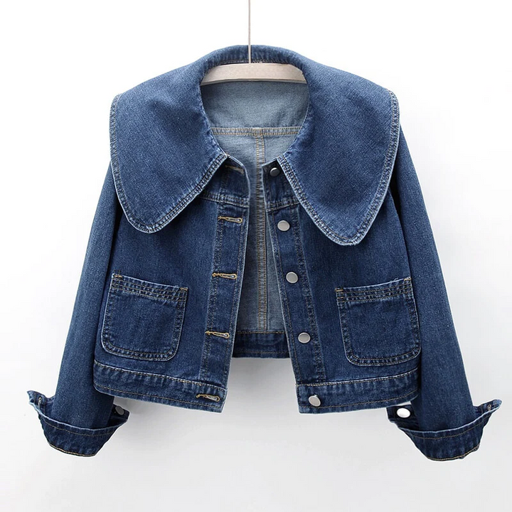 Women's chic blue cropped denim jacket featuring an oversized collar. Perfect for versatile casual outfits.