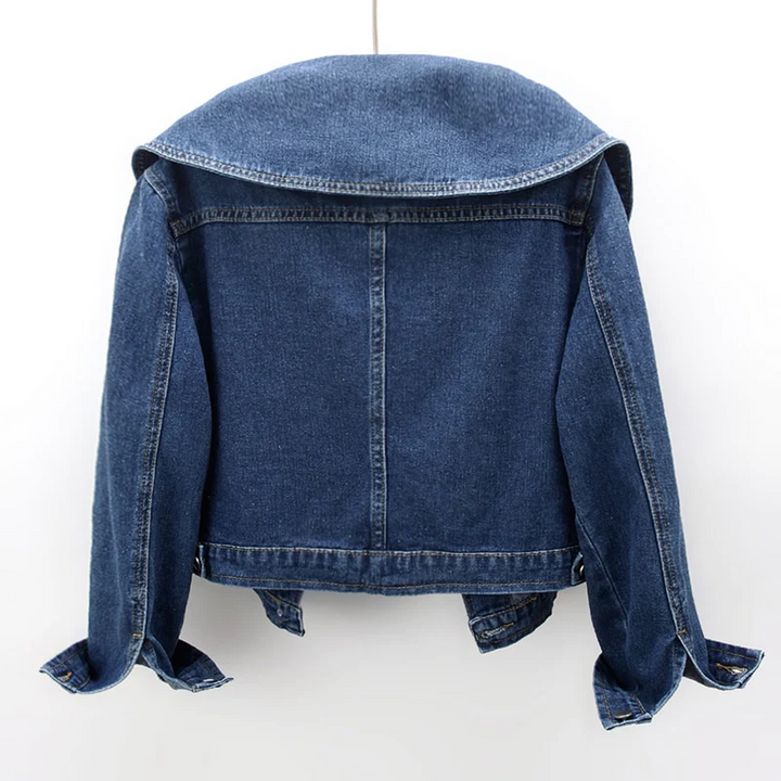Stylish women's blue cropped denim jacket with a trendy oversized collar. Ideal casual fashion outerwear.
