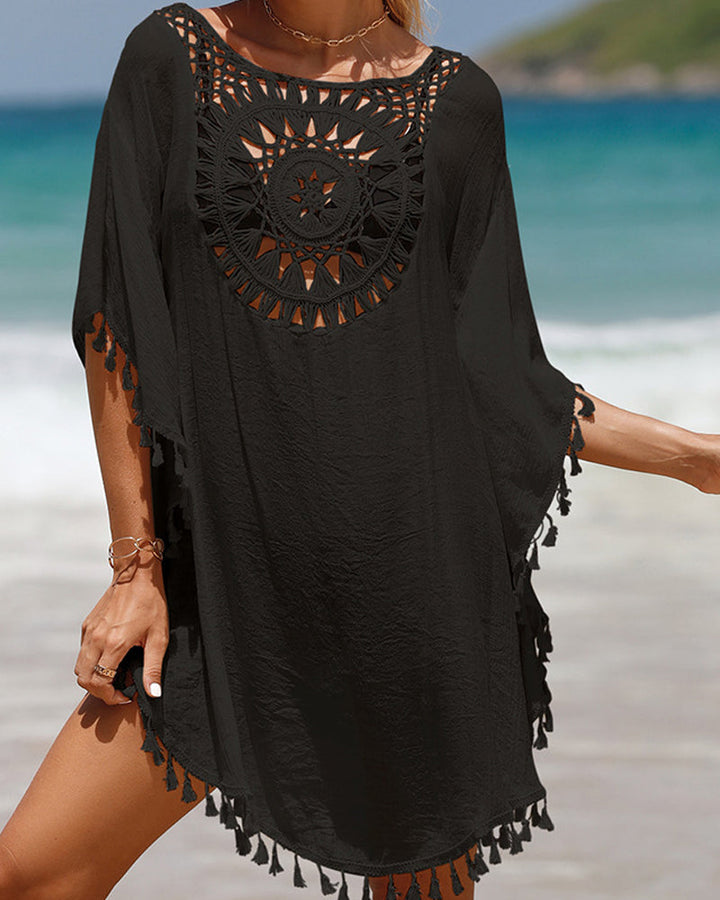 Versatile women's swim cover-up dress, perfect as a boho beach dress or stylish vacation outfit with tassels.
