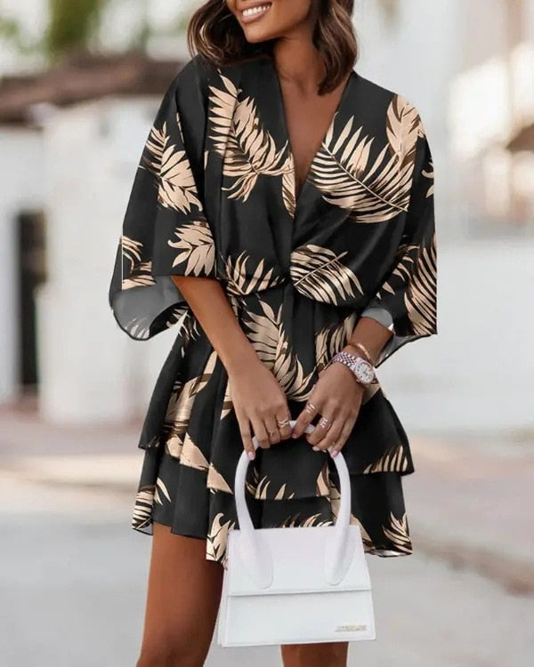 Comfortable women's flowy boho mini dress. Effortless bohemian style, perfect for summer vacation fashion.