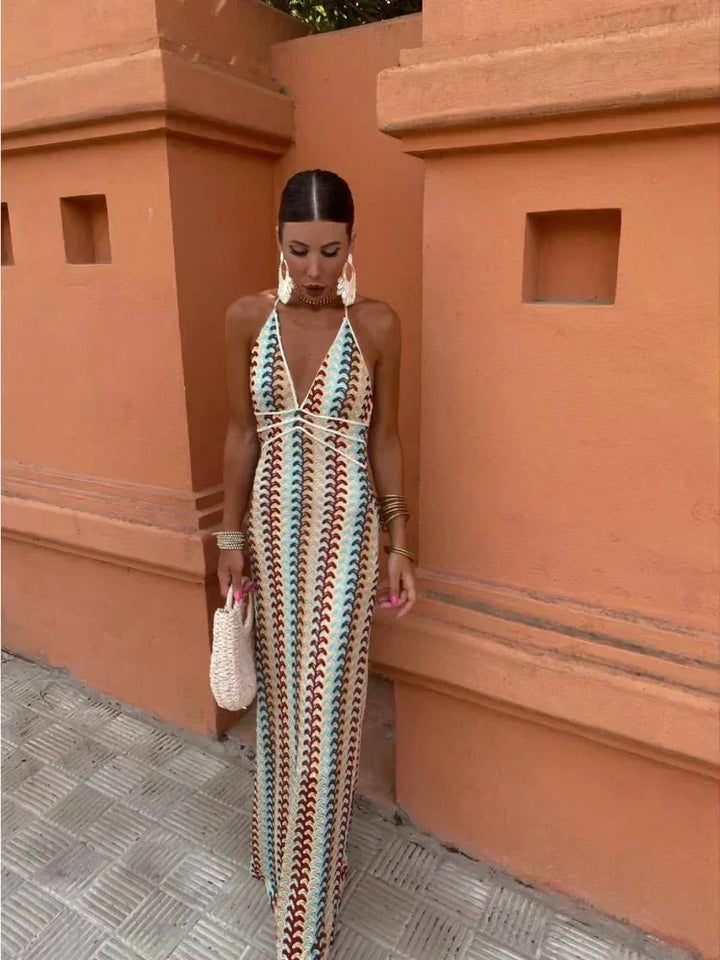 Women's chic boho printed maxi V-neck wedding guest dress, elegant for summer events.
