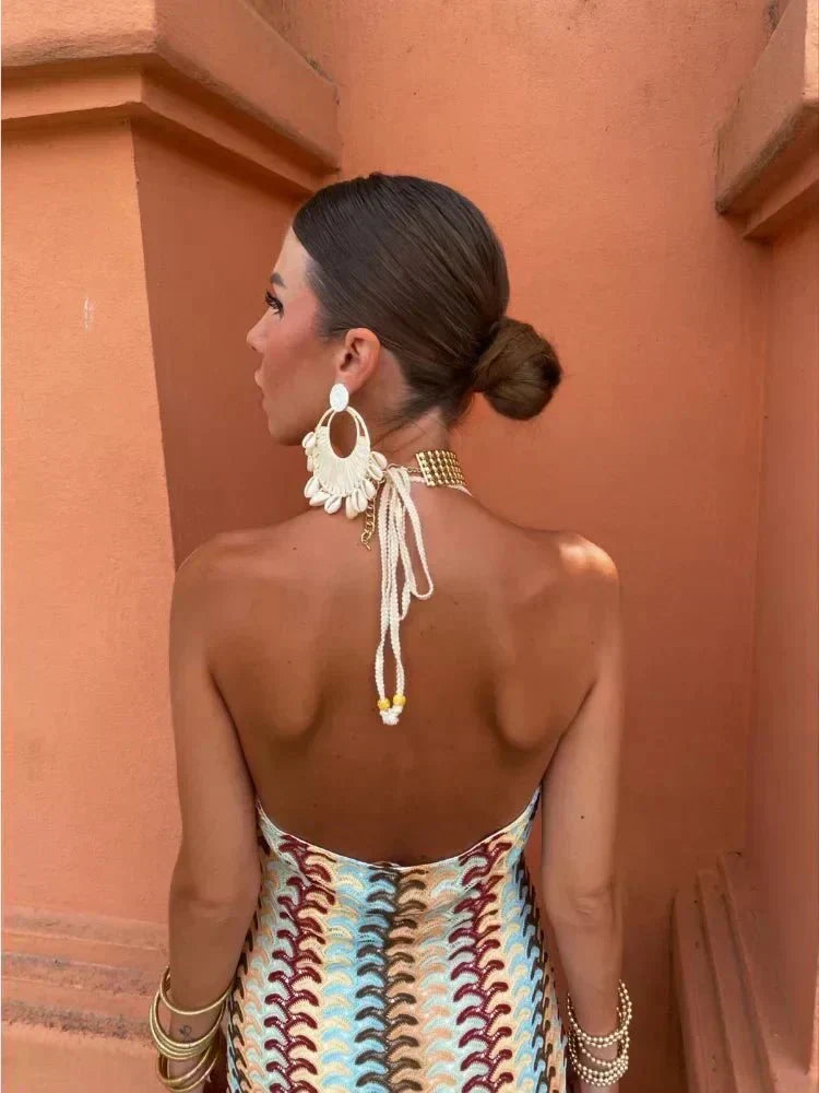 Stylish halter neck boho printed maxi dress, ideal wedding guest attire, comfortable & chic.