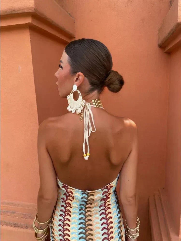 Stylish halter neck boho printed maxi dress, ideal wedding guest attire, comfortable & chic.