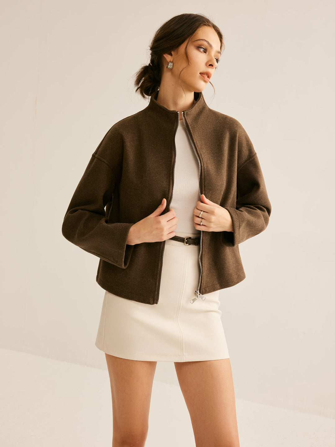 Women's chic brown zipper jacket, versatile outerwear for modern fashion.