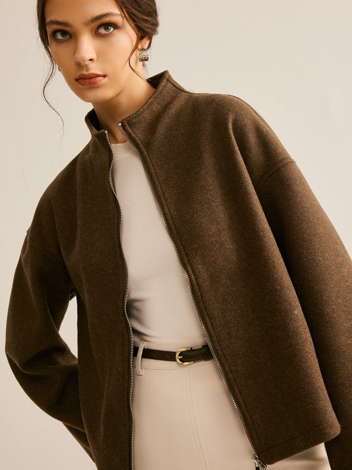 Modern brown zipper jacket for women, a stylish and versatile outerwear piece with long sleeves.