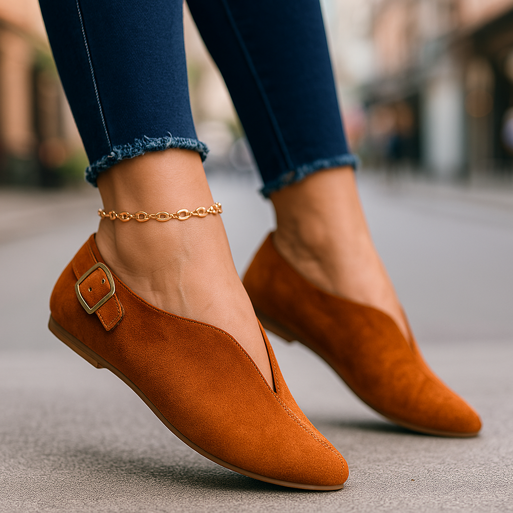Black women's buckle loafers, sleek slip-on flats for versatile everyday fashion.