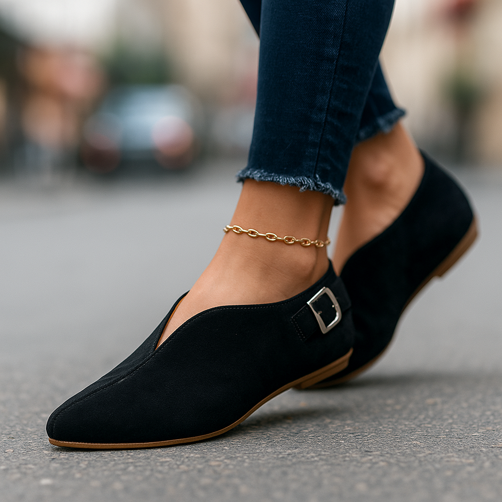 Pink women's chic buckle loafers, comfortable & stylish slip-on flats for modern wear.